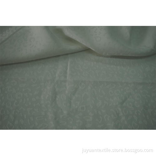 Tessuto jacquard 100% poliestere motivo leopardato Sea Island